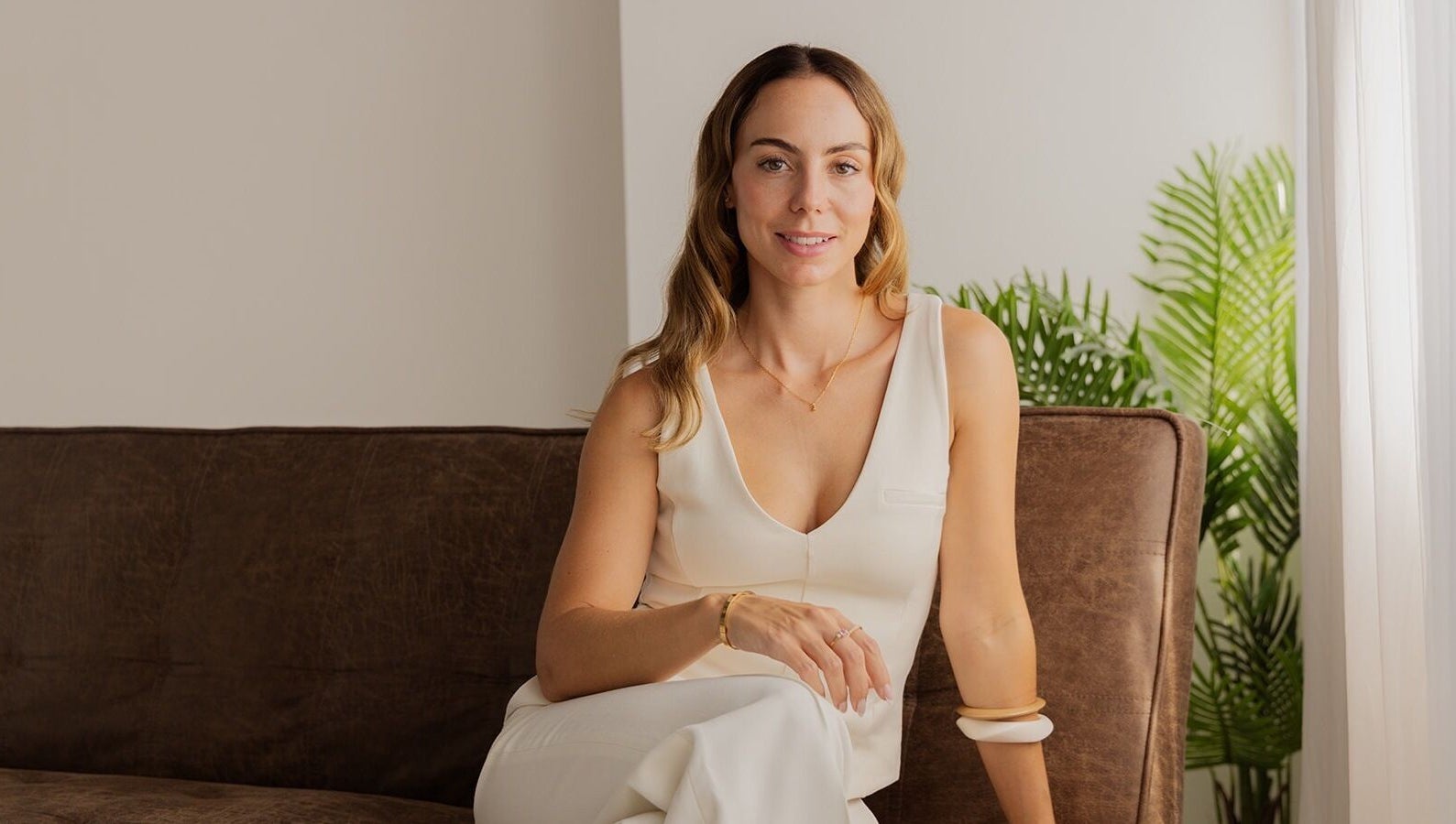 CS Aesthetic Injector Nurse Knowle Village seated in a serene, elegantly designed space in Knowle, England, GB.