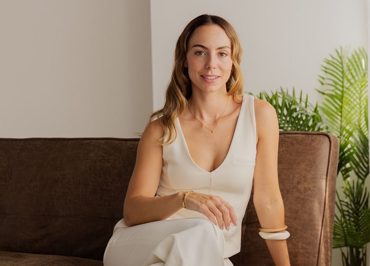 CS Aesthetic Injector Nurse Knowle Village seated in a serene, elegantly designed space in Knowle, England, GB.