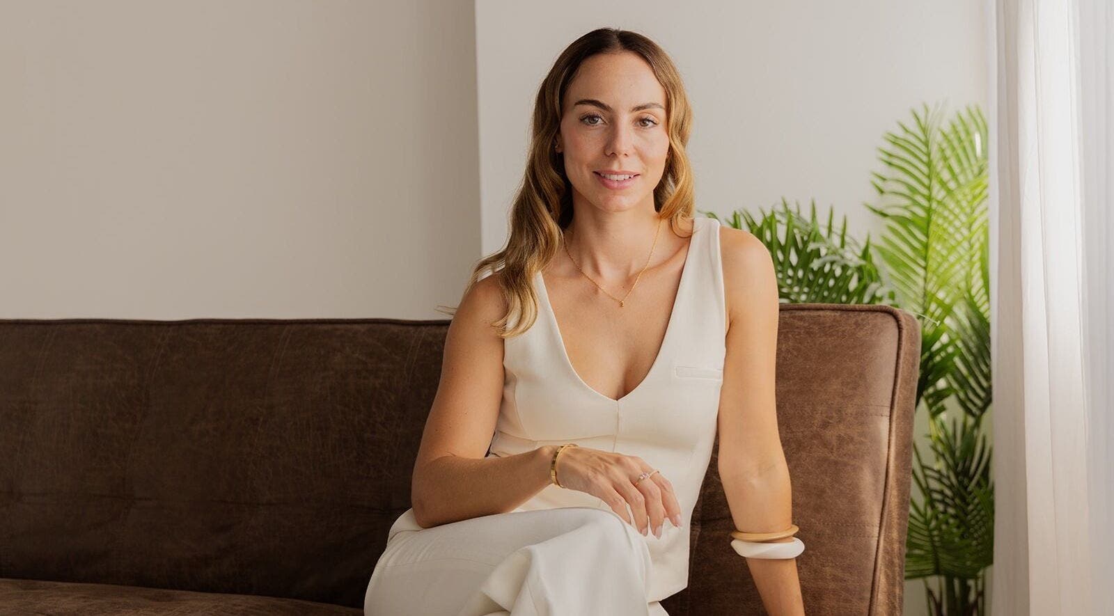 CS Aesthetic Injector Nurse Knowle Village seated in a serene, elegantly designed space in Knowle, England, GB.