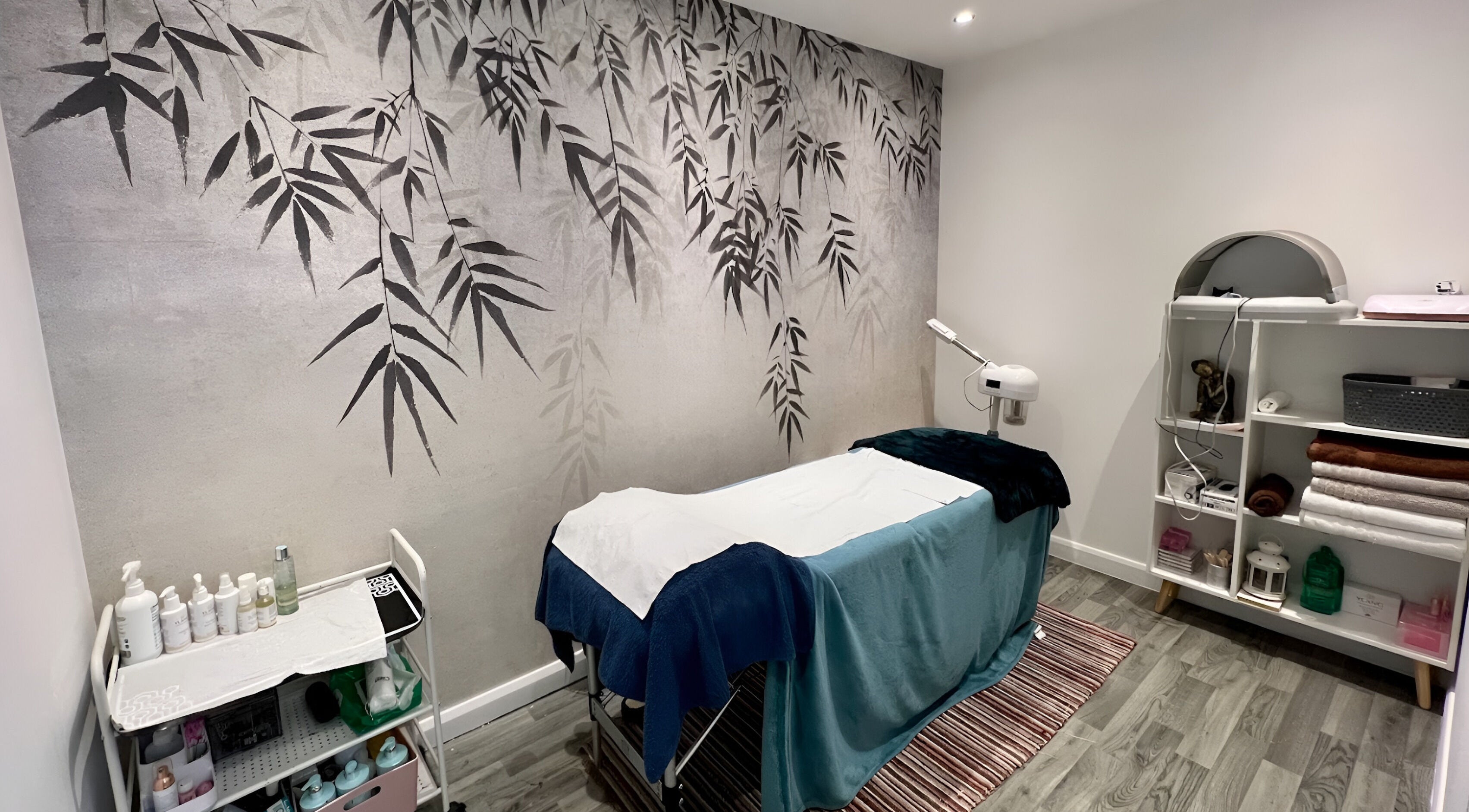 Relaxing treatment room at Eccleston Aesthetics in Saint Helens, England, GB with a calm, bamboo-themed decor.