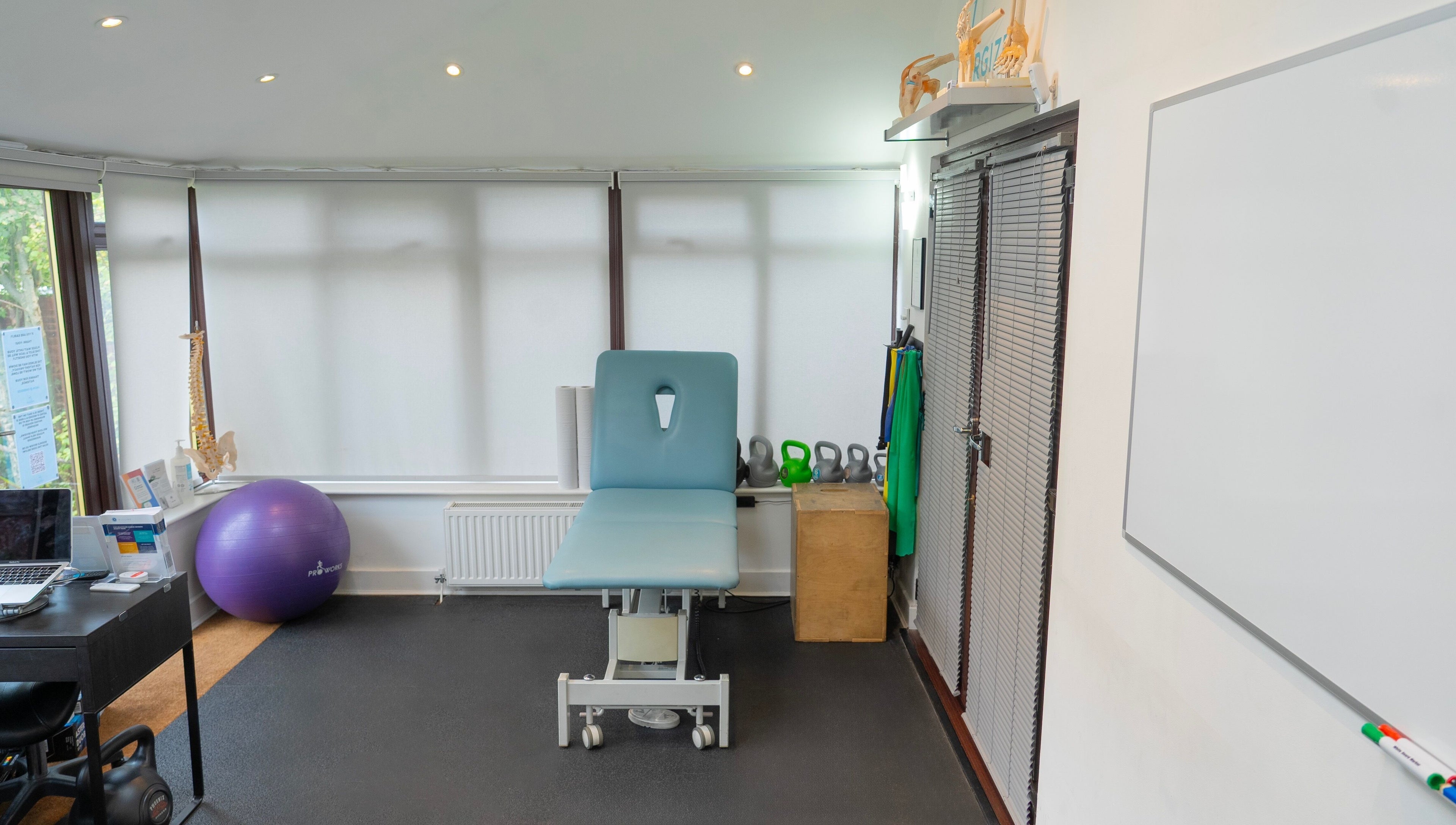 Energize Therapy's peaceful treatment room at Droitwich Spa, England, GB, showcasing a modern therapy setup.