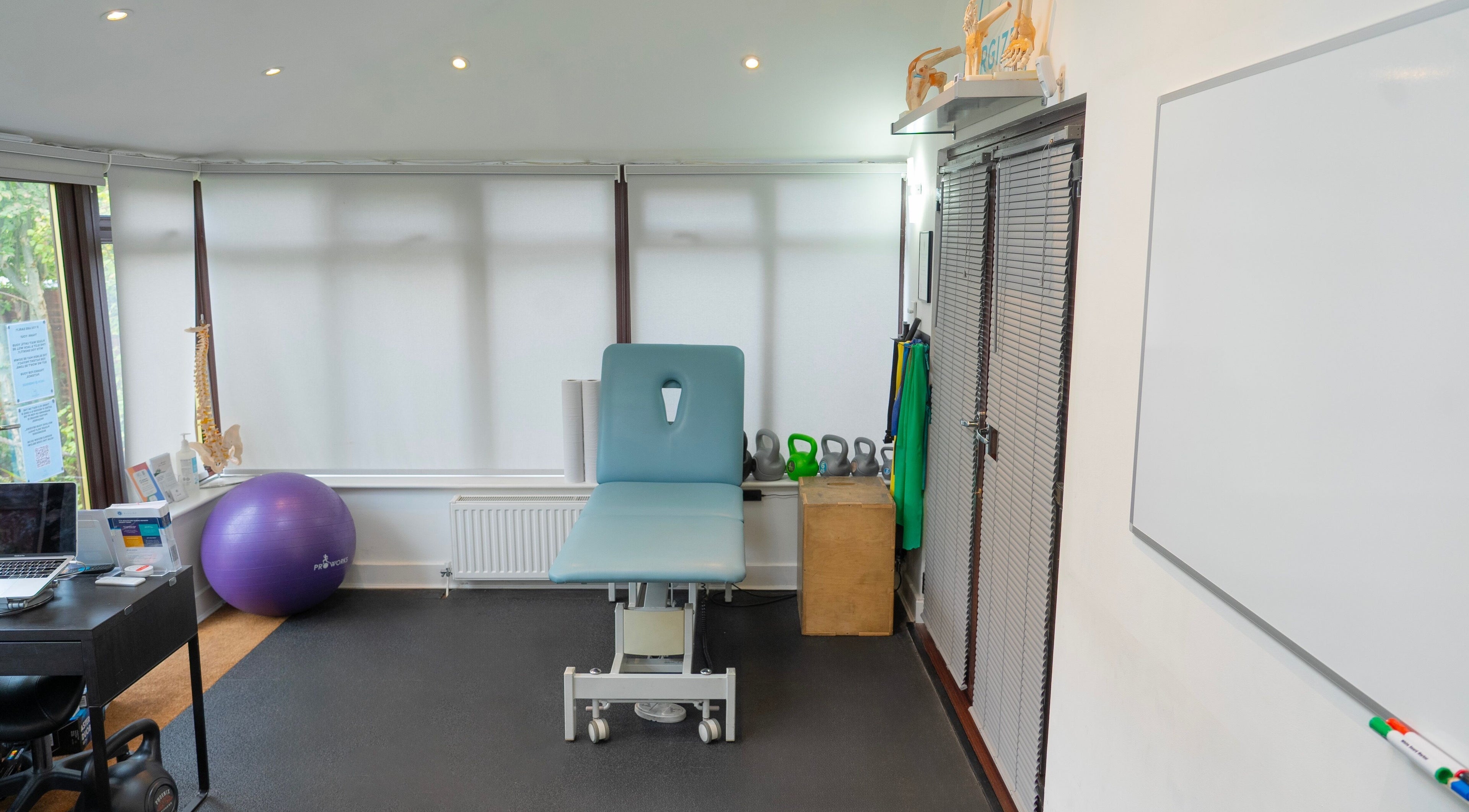 Energize Therapy's peaceful treatment room at Droitwich Spa, England, GB, showcasing a modern therapy setup.