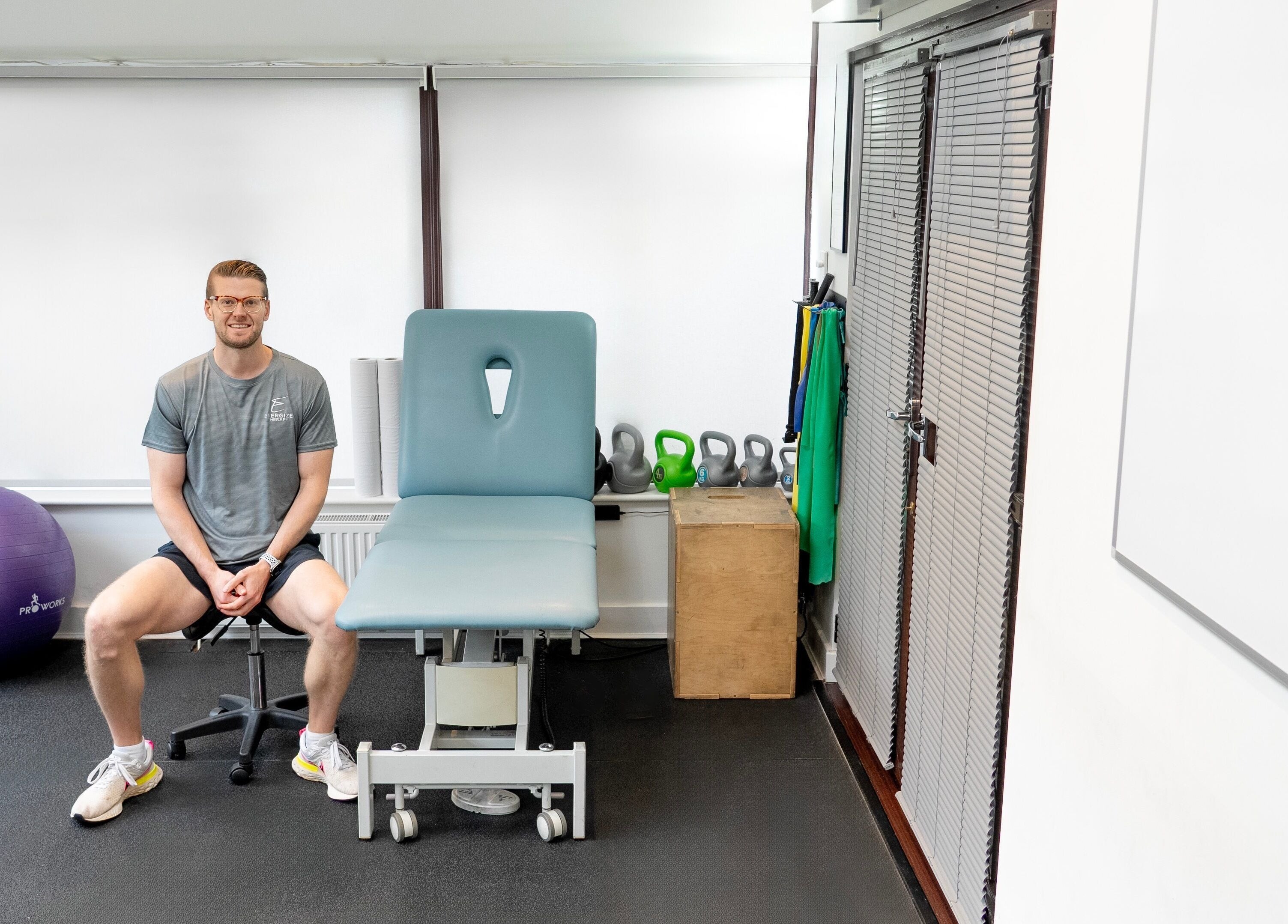 Cozy therapy room at Energize Therapy in Droitwich Spa, England, GB, with equipment for wellness sessions.