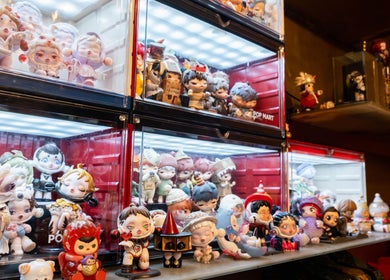 Whimsical figurines displayed at Vavi Thai Massage Soho, London, England, GB for a charming ambiance.