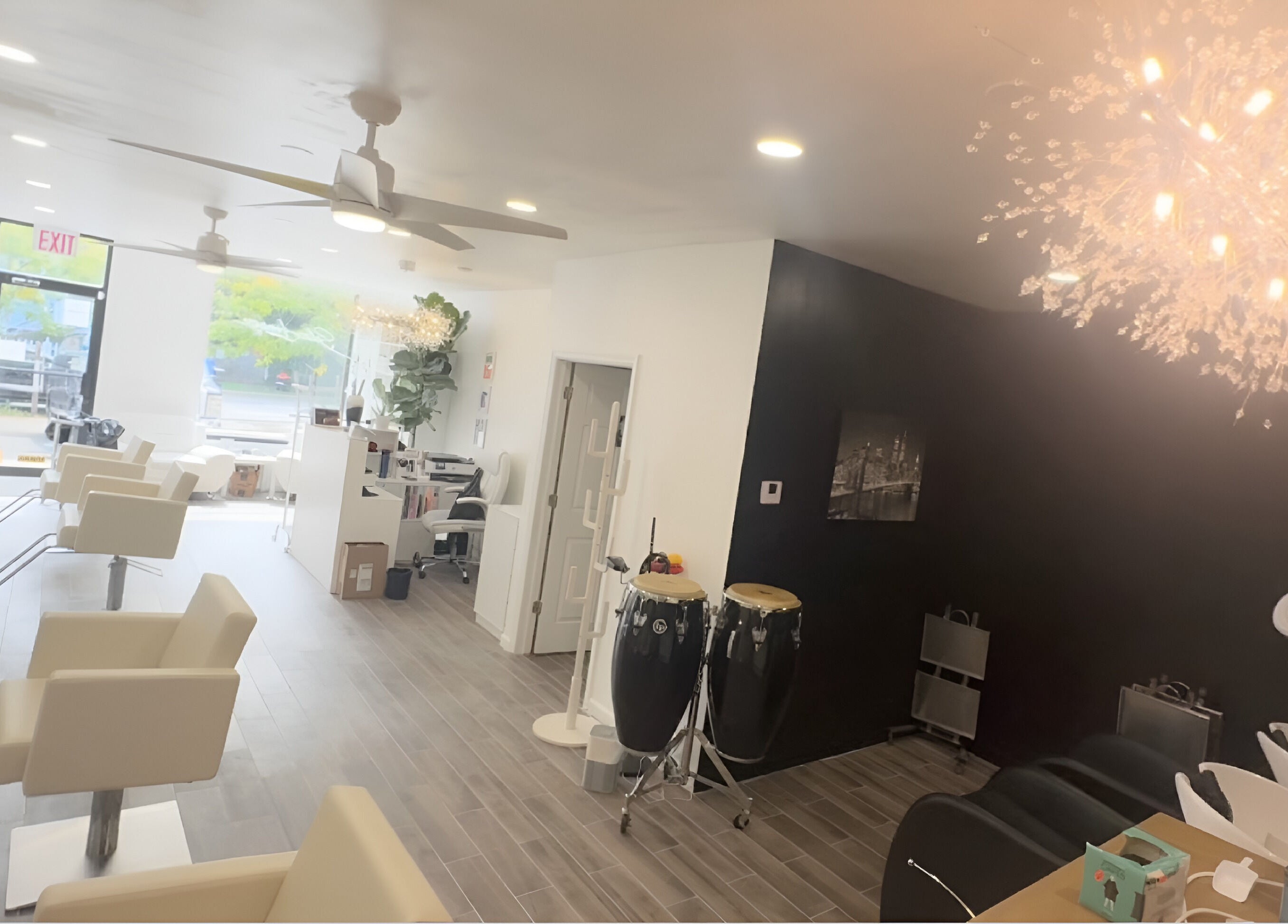 Bright, modern interior of Salon Lounge in New York, New York, US featuring elegant chairs and ambient lighting.