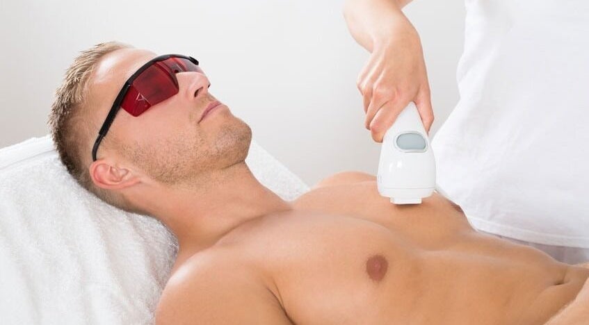 Man receives chest laser treatment at Beauty Expressed in Colours, Marsascala, MT.