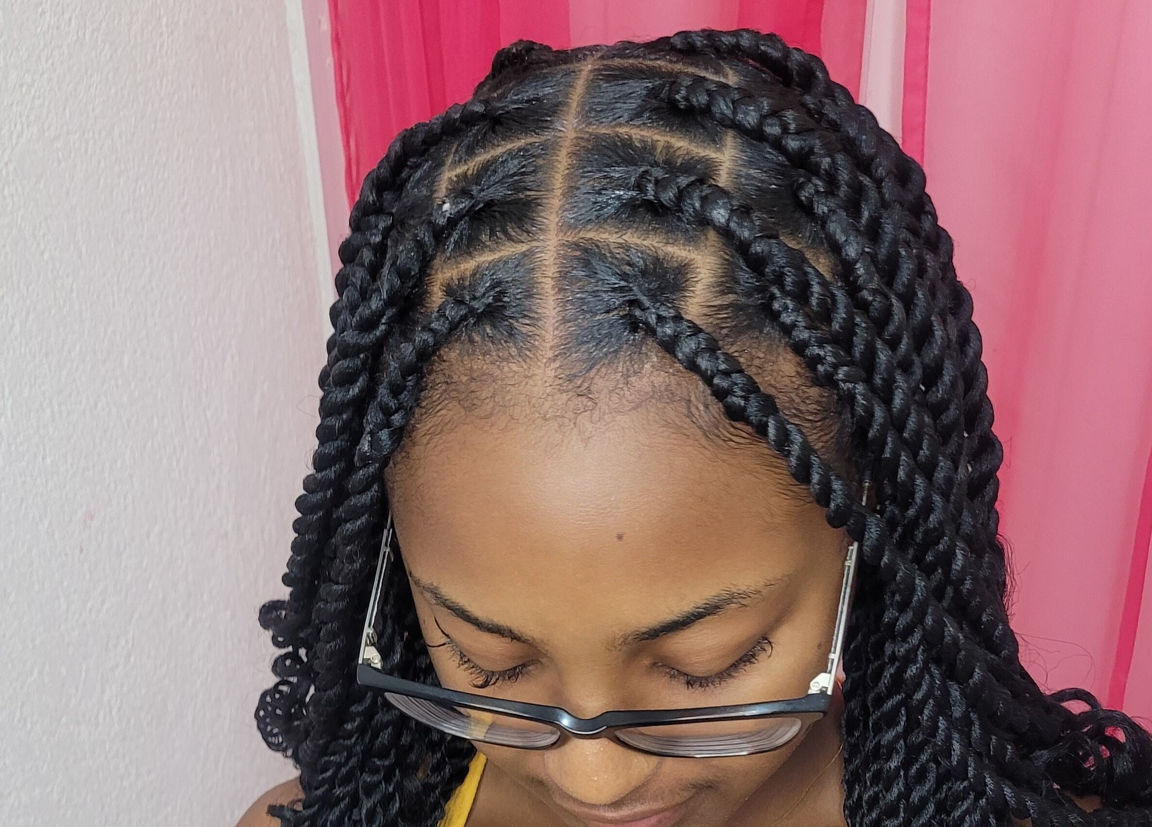 Woman with intricate braids at M'Shantelle Beautii, Speightstown, Saint Peter, BB.