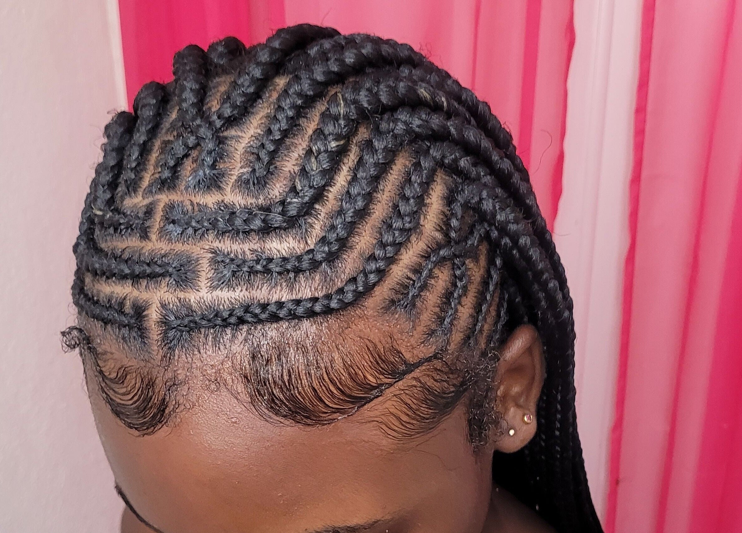 Intricate braided hairstyle at M'Shantelle Beautii, Speightstown, Saint Peter, BB.