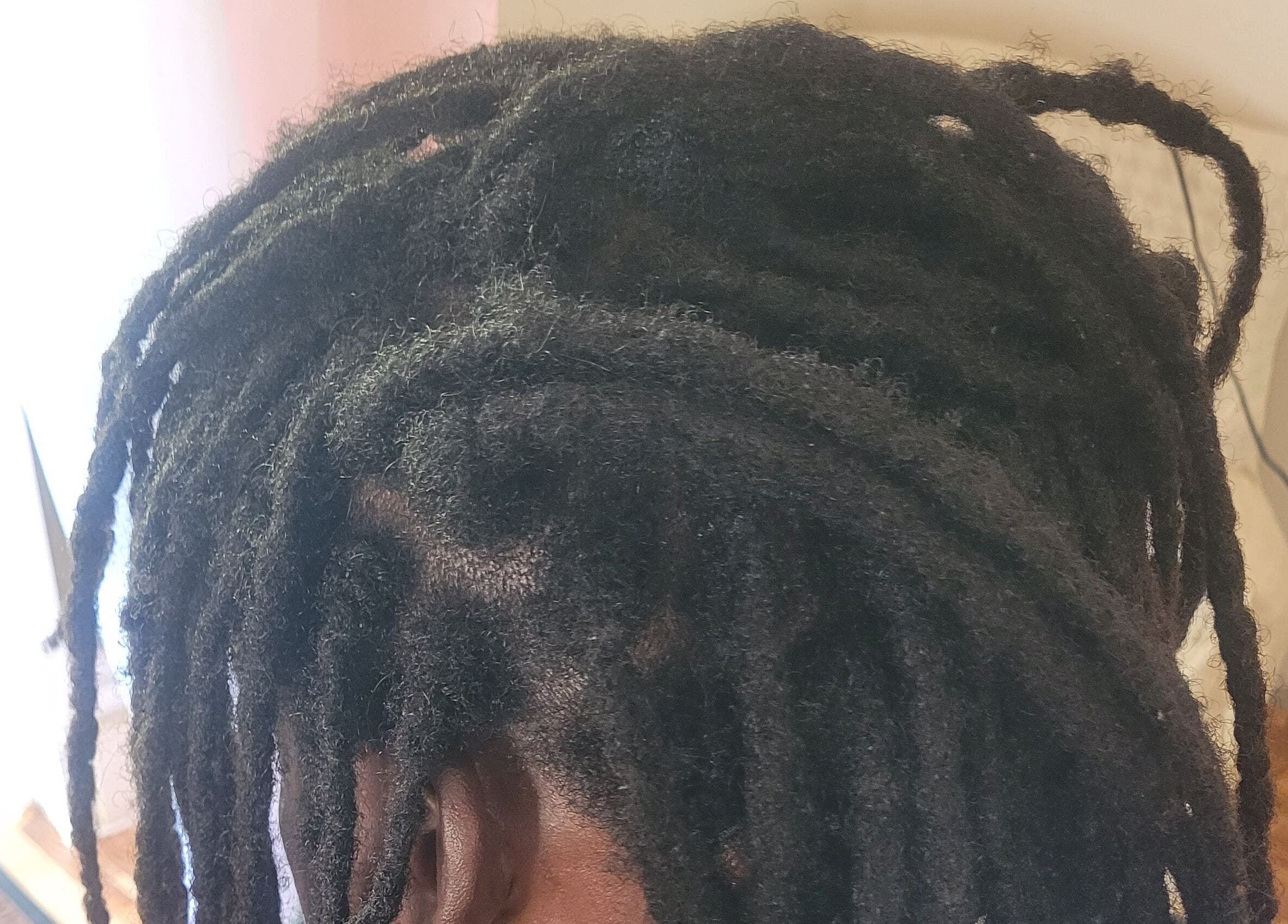 Close-up of styled dreadlocks at M'Shantelle Beautii in Speightstown, Saint Peter, BB.