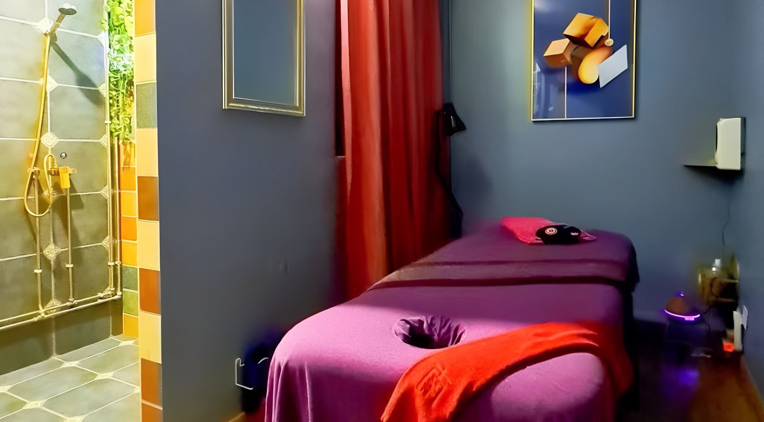 Cozy massage room at Bentley Wellness AMK, Singapore, Singapore, SG with vibrant red accents and modern shower.