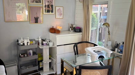Elegant nail station at Kora Beauty in Great Dunmow, England, GB, featuring modern decor and styling products.