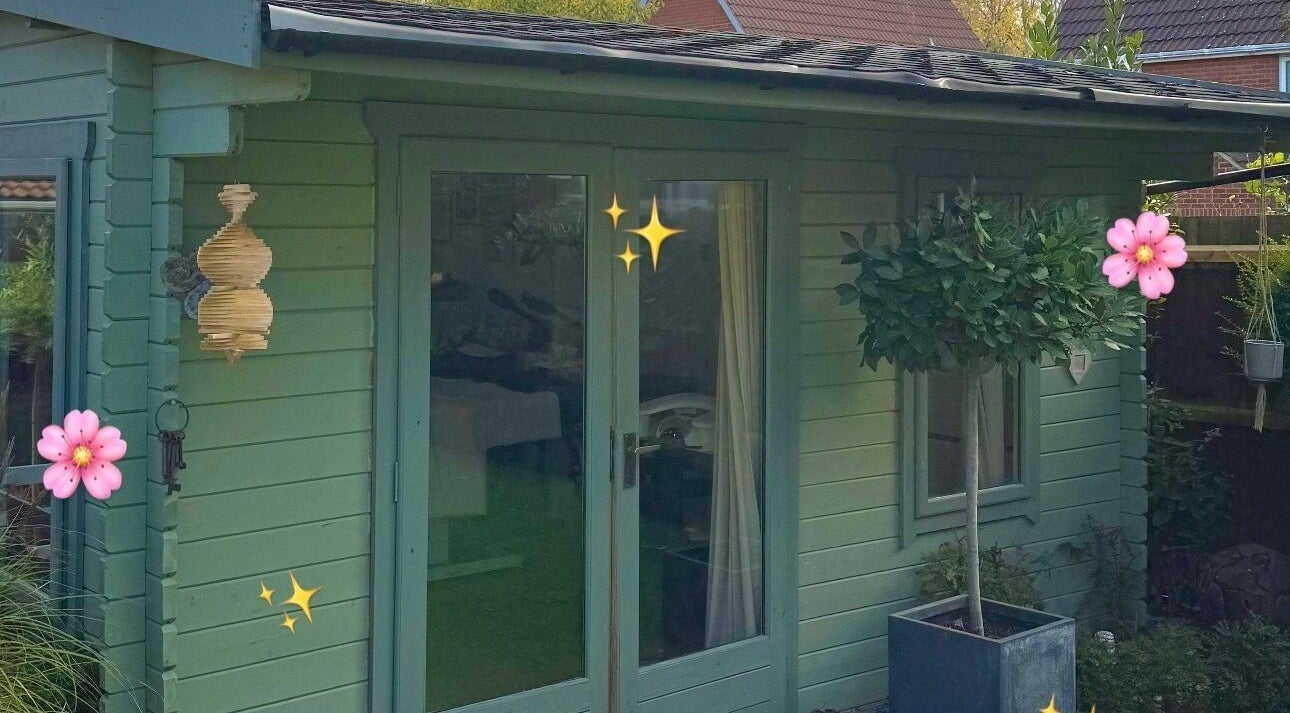 Peaceful green studio at Kora Beauty, Great Dunmow, England, GB, surrounded by plants and flowers.