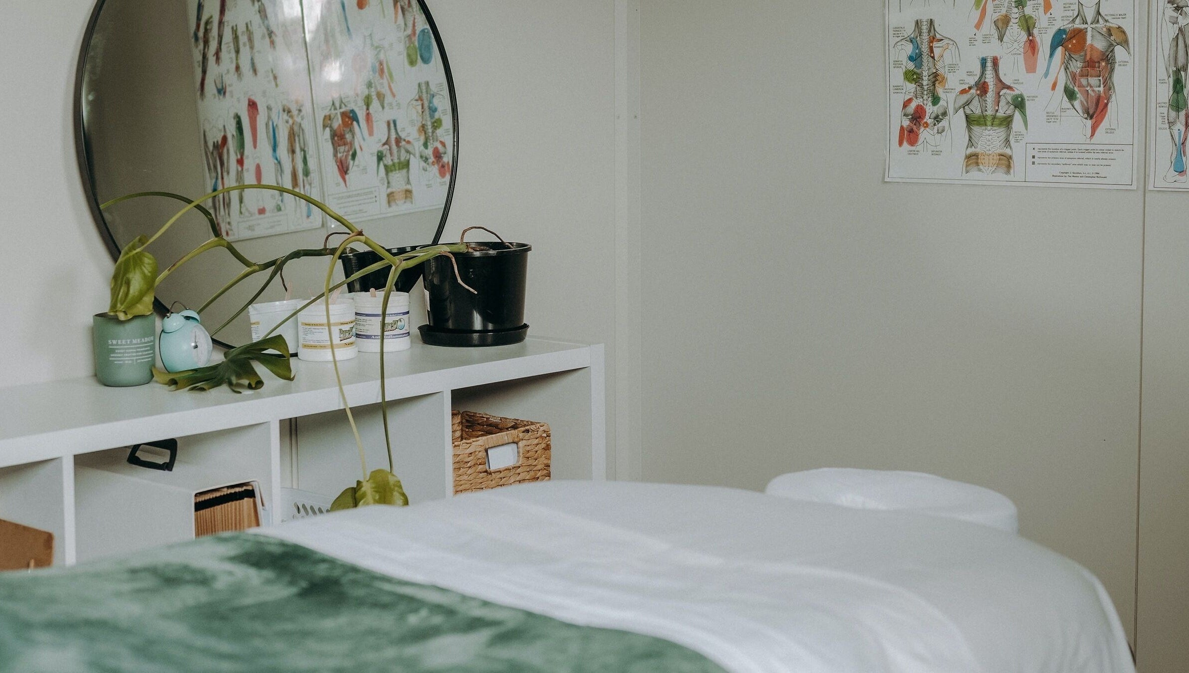 Inviting massage room at Massage by Ash, Kaiapoi, Canterbury, NZ with a cozy bed and calming decor.
