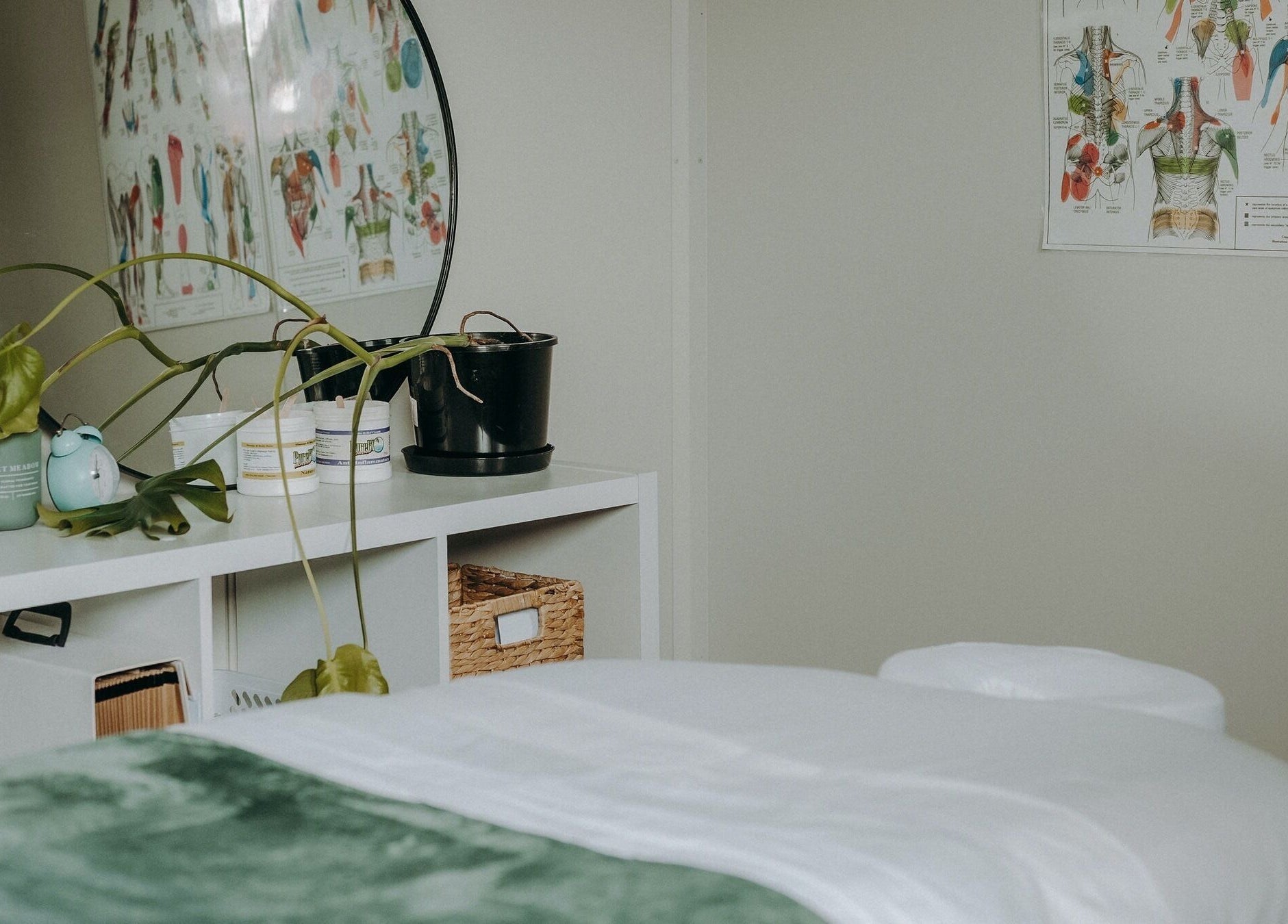 Inviting massage room at Massage by Ash, Kaiapoi, Canterbury, NZ with a cozy bed and calming decor.