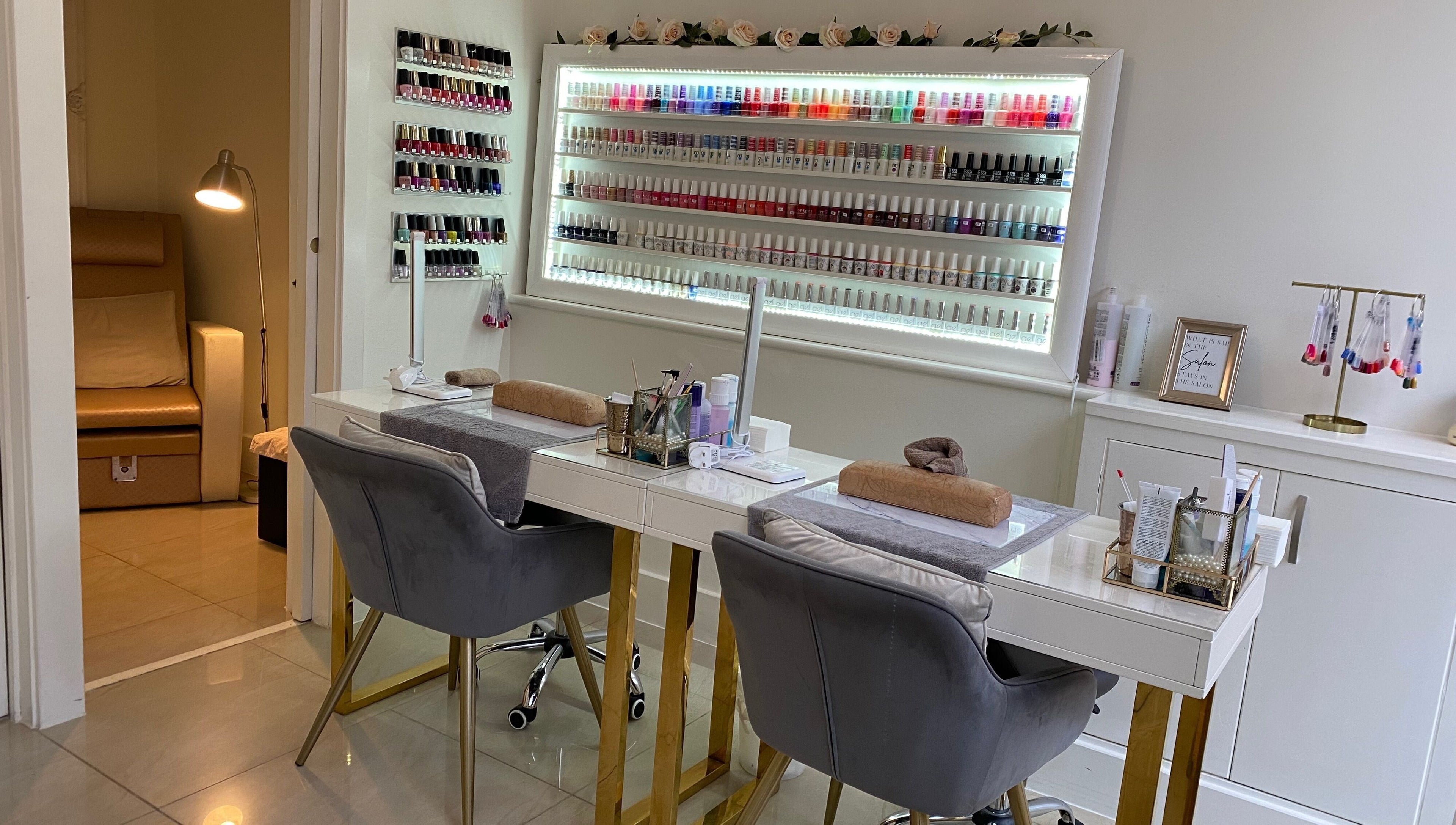 Manicure station at Beauty at No.1, featuring nail polish display in Berkhamsted, England, GB.