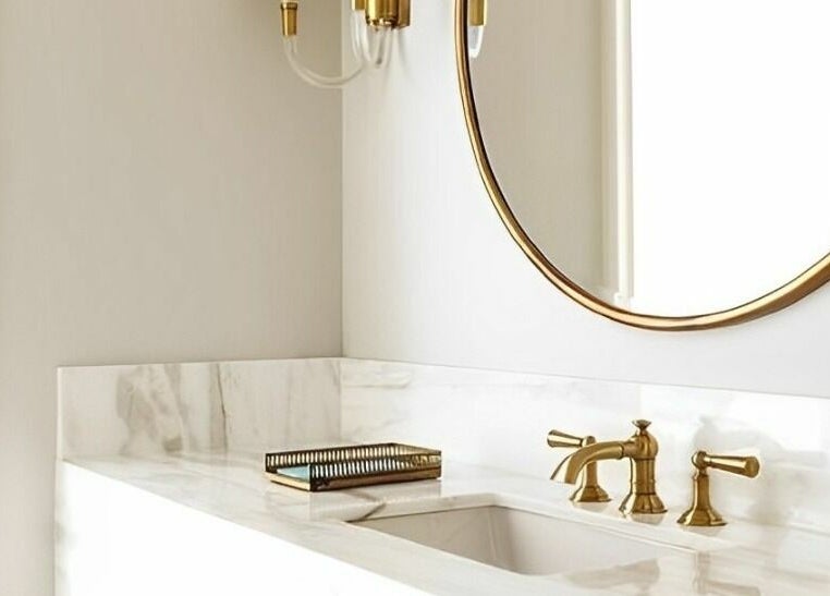 Elegant marble vanity with gold fixtures at Skinn Haven, Penrith, New South Wales, AU showcasing luxury design.