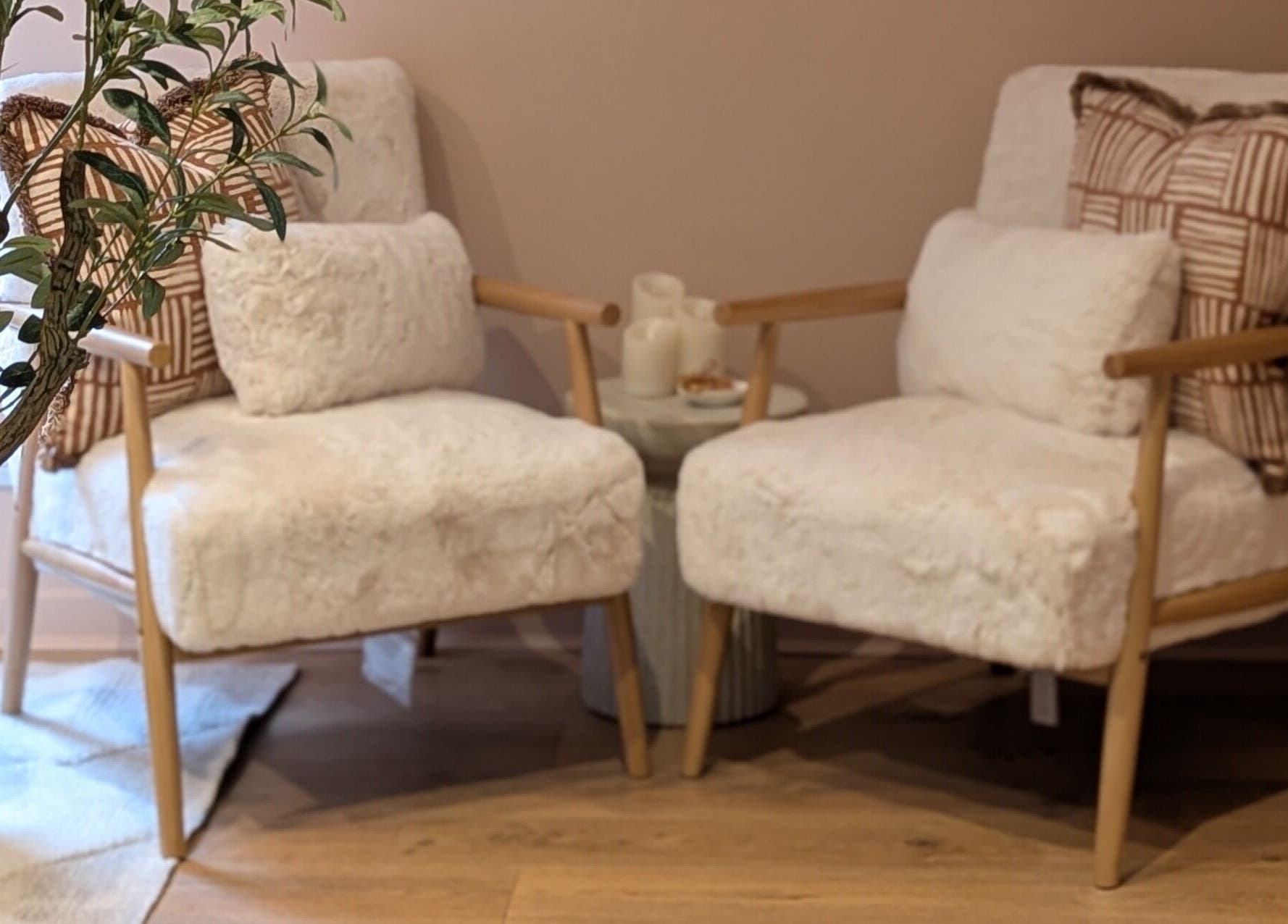 Elegant seating area at Glow Studio by Suzanne Wilson, Musselburgh, Scotland, GB with soft chairs and decor.
