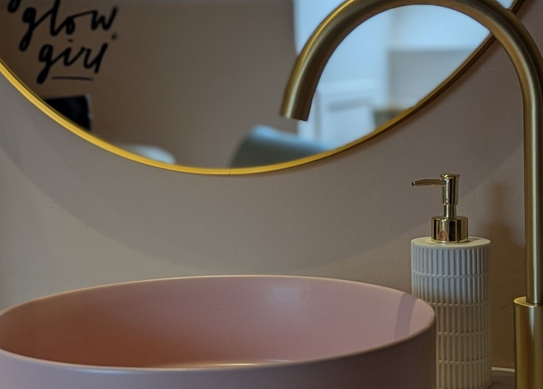 Chic pink basin with gold faucet at Glow Studio by Suzanne Wilson, Musselburgh, Scotland, GB, embodying style.