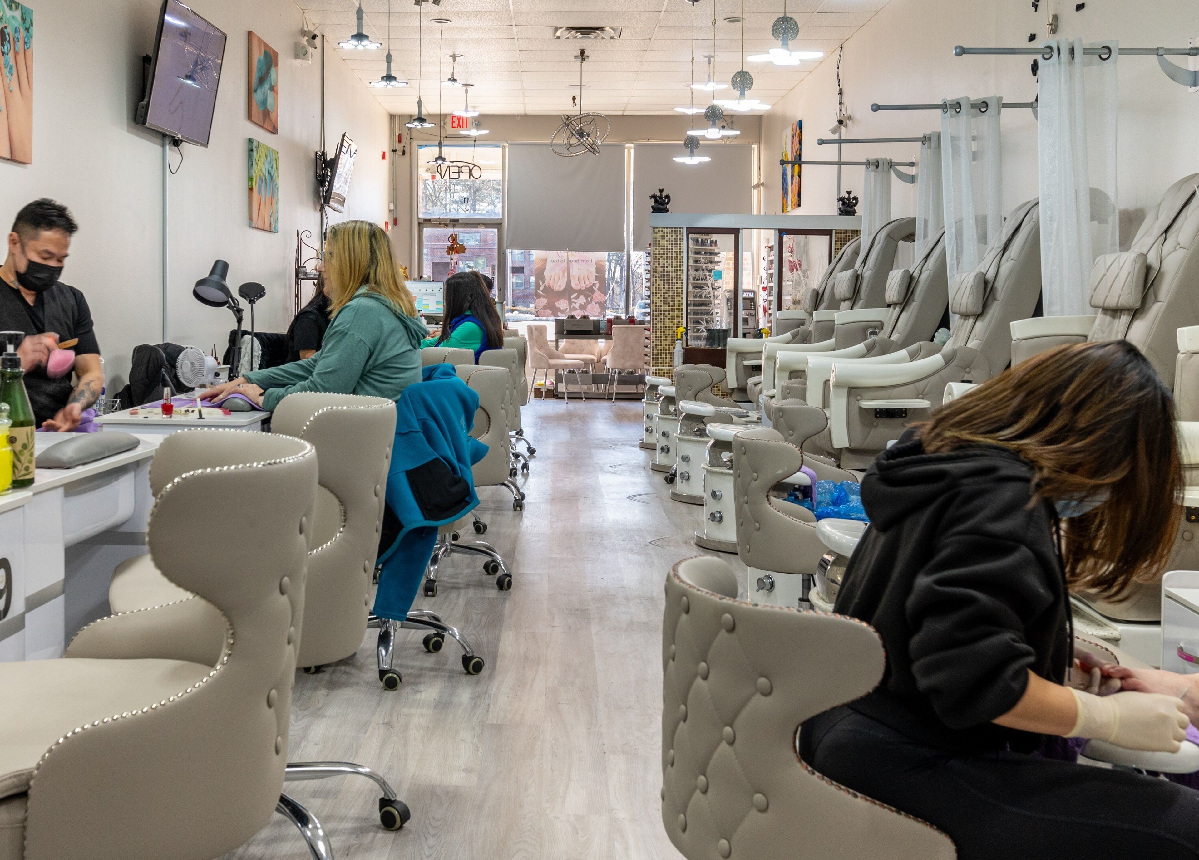 Luxor Nails and Spa, North Reading, Massachusetts. Bright, welcoming interior with manicure and pedicure stations.