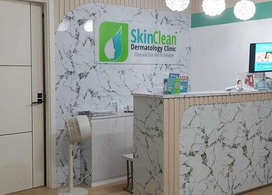 Reception area of Skin Clean Dermatology Clinic in Biñan, Calabarzon, PH with sleek marble decor.