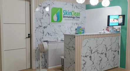 Reception area of Skin Clean Dermatology Clinic in Biñan, Calabarzon, PH with sleek marble decor.