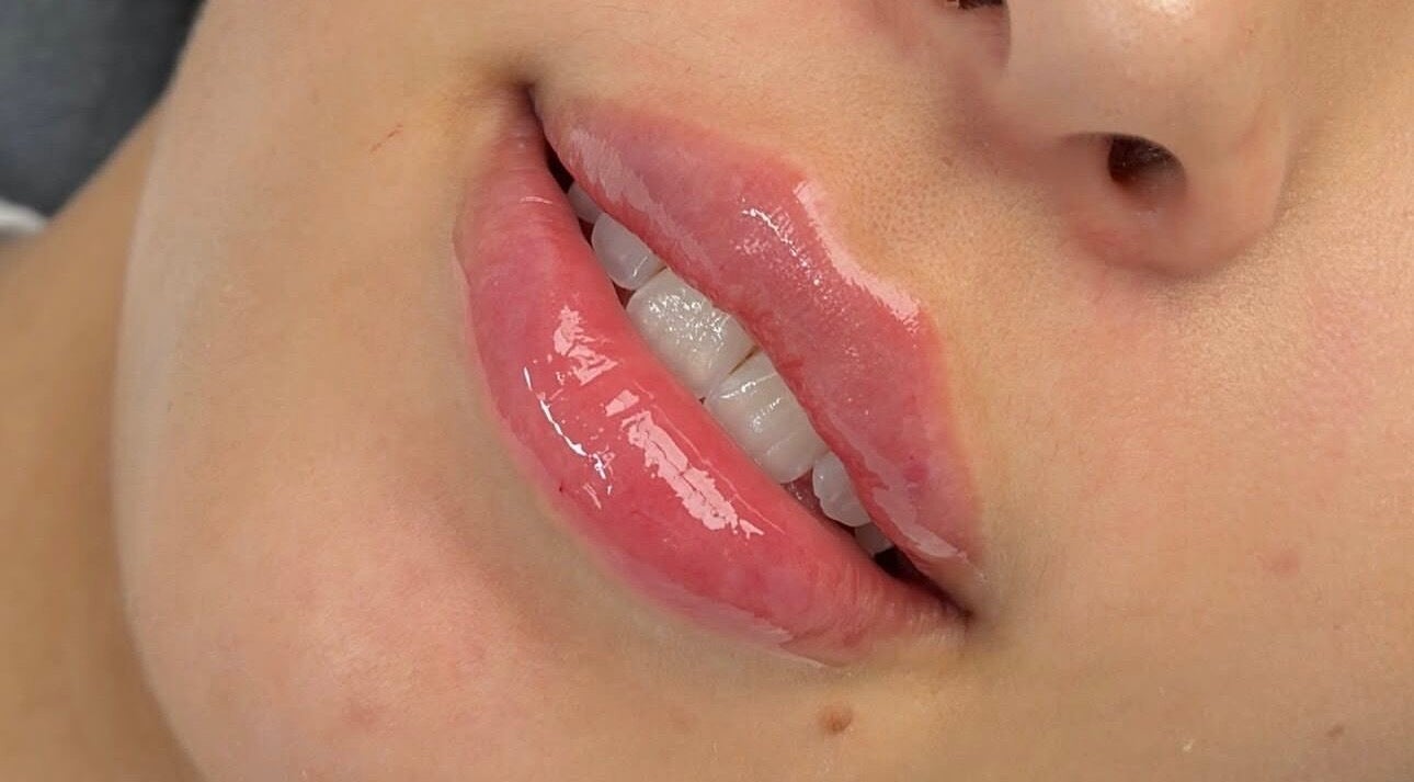 Close-up of glossy lips at Sophiesticated Beauty, Thatcham, England, GB showcasing lip treatments.
