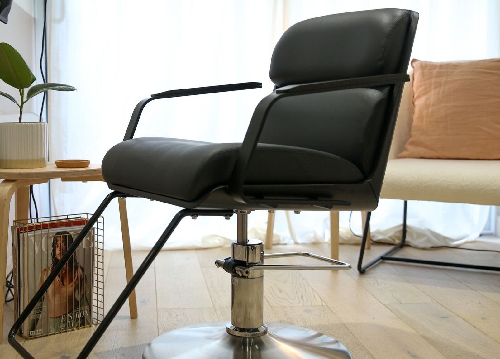 Stylish salon chair at Home of Cole Jackson, London, England, GB. Modern aesthetic for beauty services.
