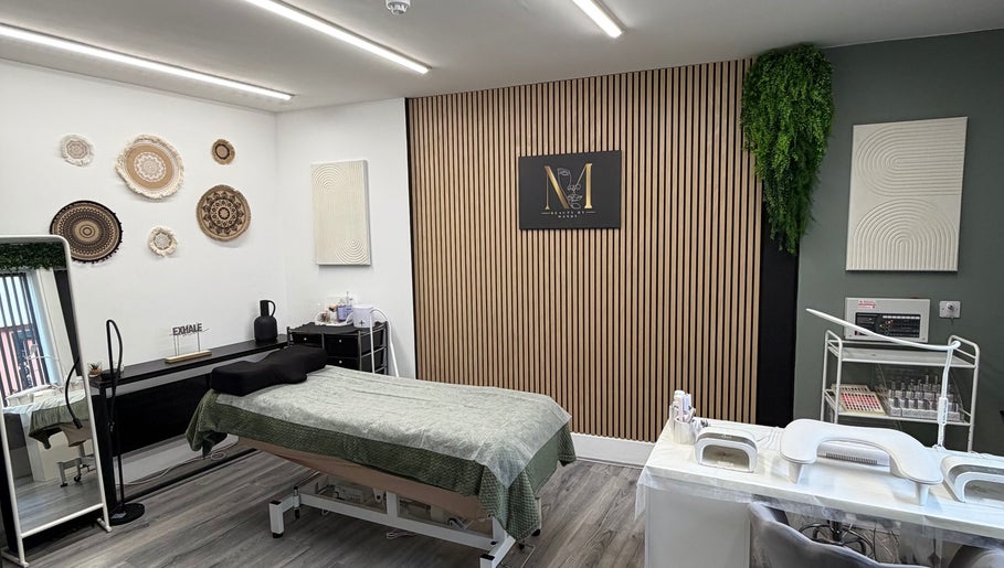 Beauty by Mandy salon interior in Whitehaven, England, featuring a sleek treatment area with modern decor.