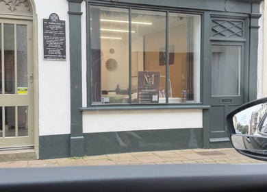 Exterior of Beauty by Mandy salon in Whitehaven, England, GB, showcasing a stylish window display.