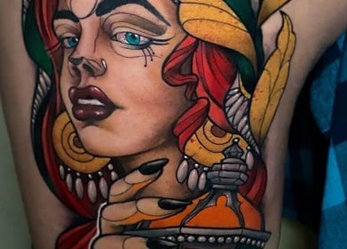 Tatuaje colorido en la pierna en Rr Tattoo & Piercing Studio, Benidorm, Comunidad Valenciana, ES.