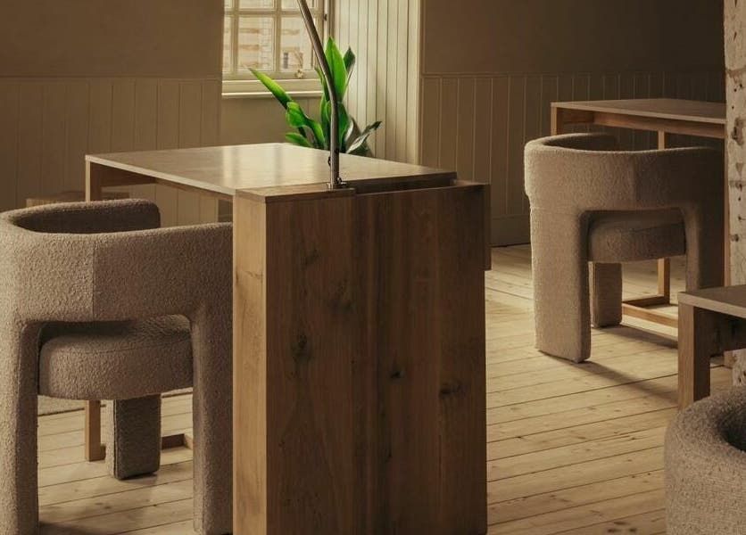 Rustic minimalist seating area at Buff St Ninian's Manse, Edinburgh, Scotland, GB.