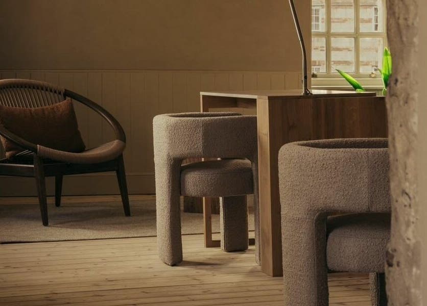 Cozy chairs and chic decor at Buff St Ninian's Manse, Edinburgh, Scotland, GB.