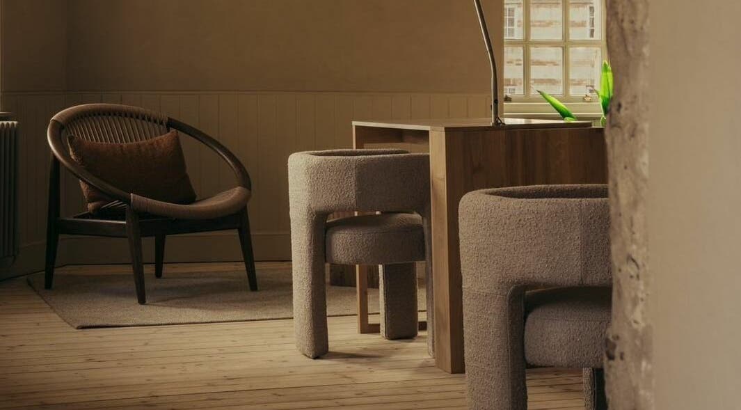 Cozy chairs and chic decor at Buff St Ninian's Manse, Edinburgh, Scotland, GB.