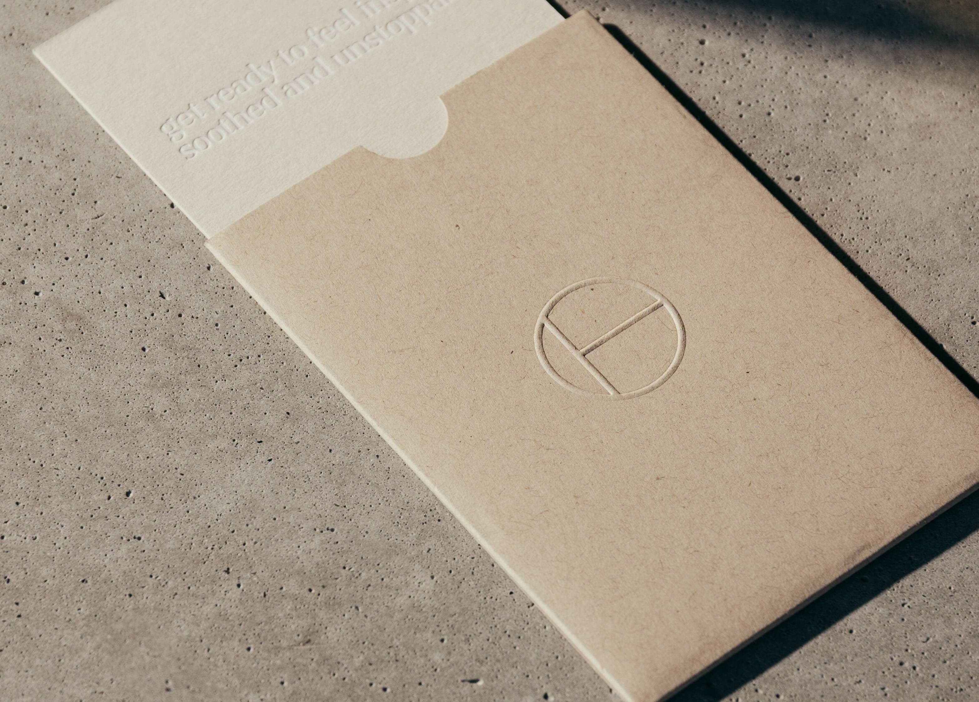 Elegant card on stone surface at Buff Concept Store, Edinburgh, Scotland, GB, showcasing its minimalist design.