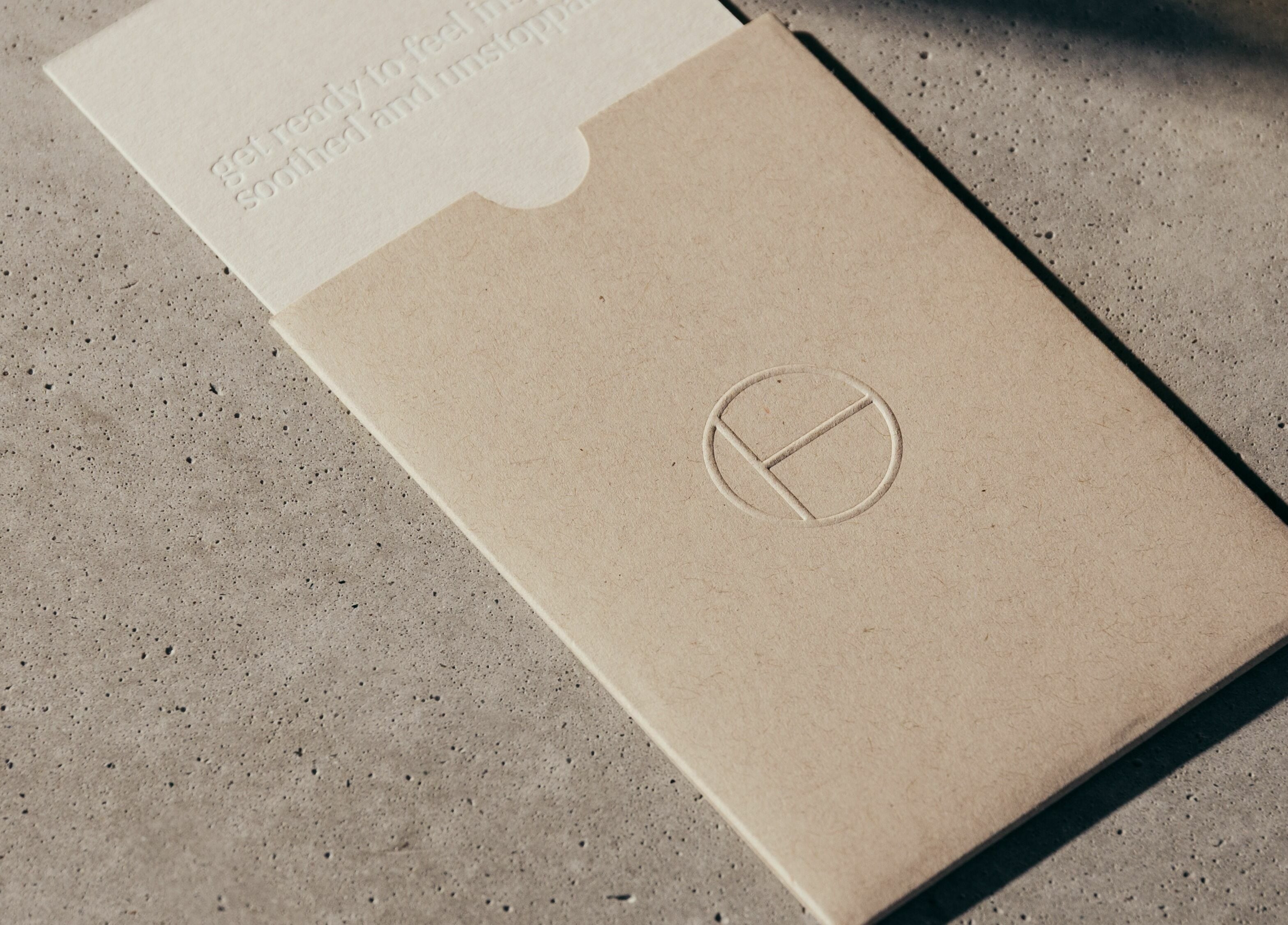 Elegant card on stone surface at Buff Concept Store, Edinburgh, Scotland, GB, showcasing its minimalist design.