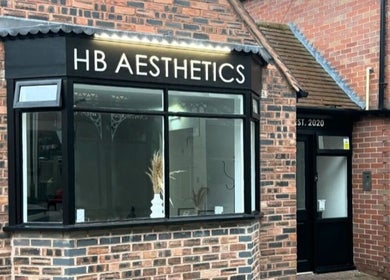 Exterior view of Nails By Donna in Cannock, England, GB, showcasing stylish black-framed windows.