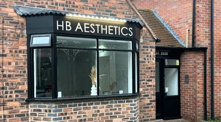Exterior view of Nails By Donna in Cannock, England, GB, showcasing stylish black-framed windows.