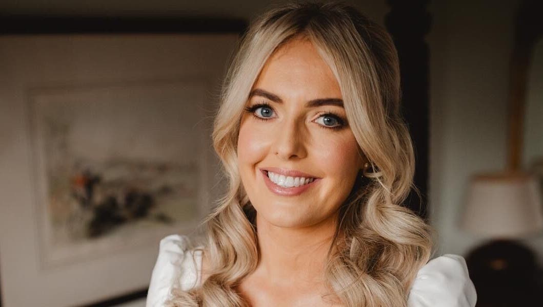 Smiling woman with styled hair at Obsessedhair by Dearbhaile, Limerick, County Limerick, IE.