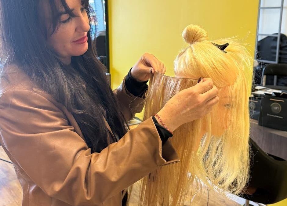 Stylist working on extensions at Obsessedhair by Dearbhaile, Limerick, County Limerick, IE.