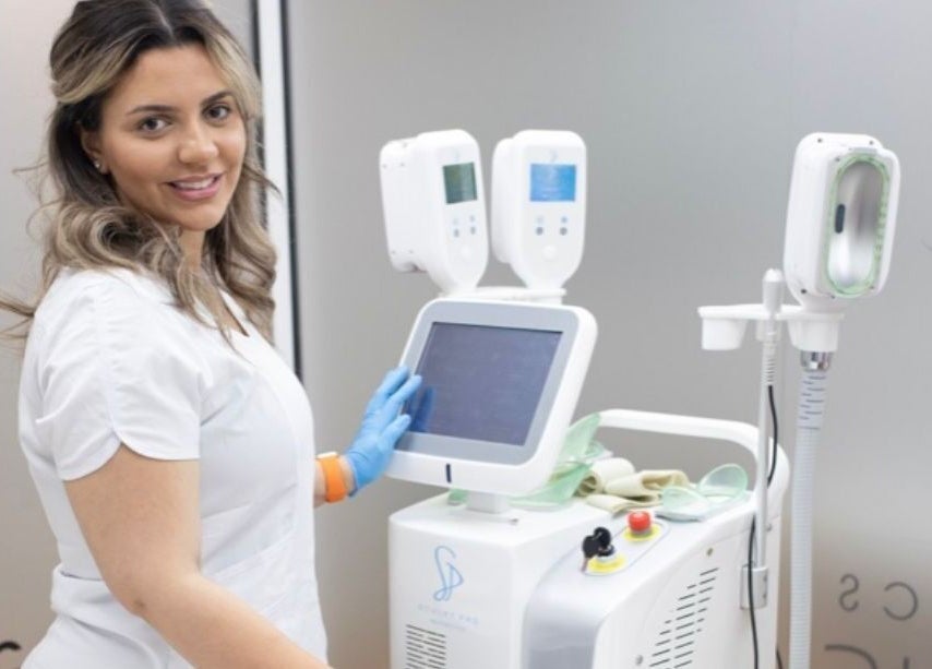 Professional at Sculptor Aesthetics in Edgware, England, GB using advanced beauty equipment.