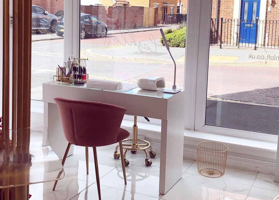 Elegant workspace with pink chair at The Lashloft, Newcastle upon Tyne, England, GB.