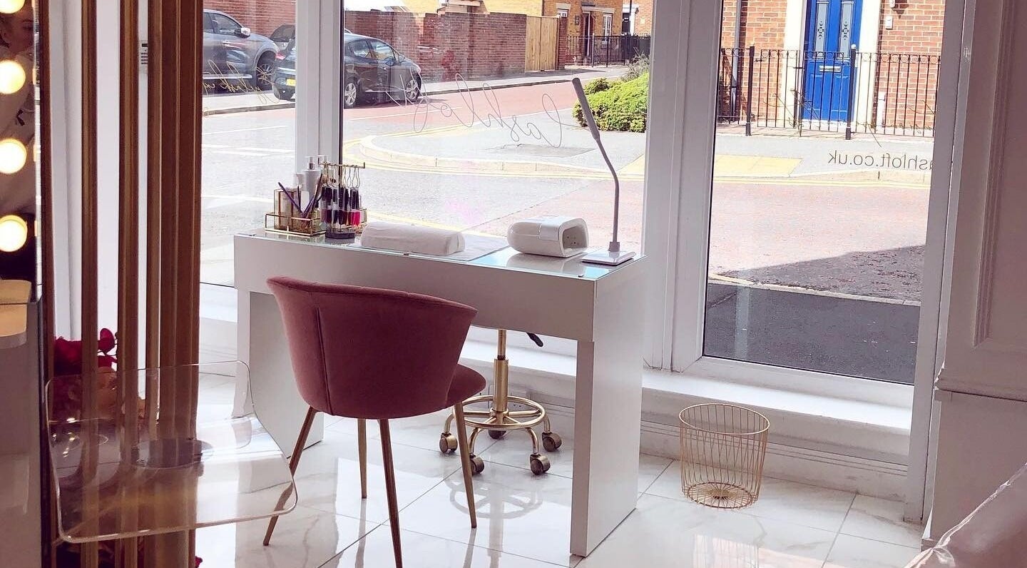 Elegant workspace with pink chair at The Lashloft, Newcastle upon Tyne, England, GB.