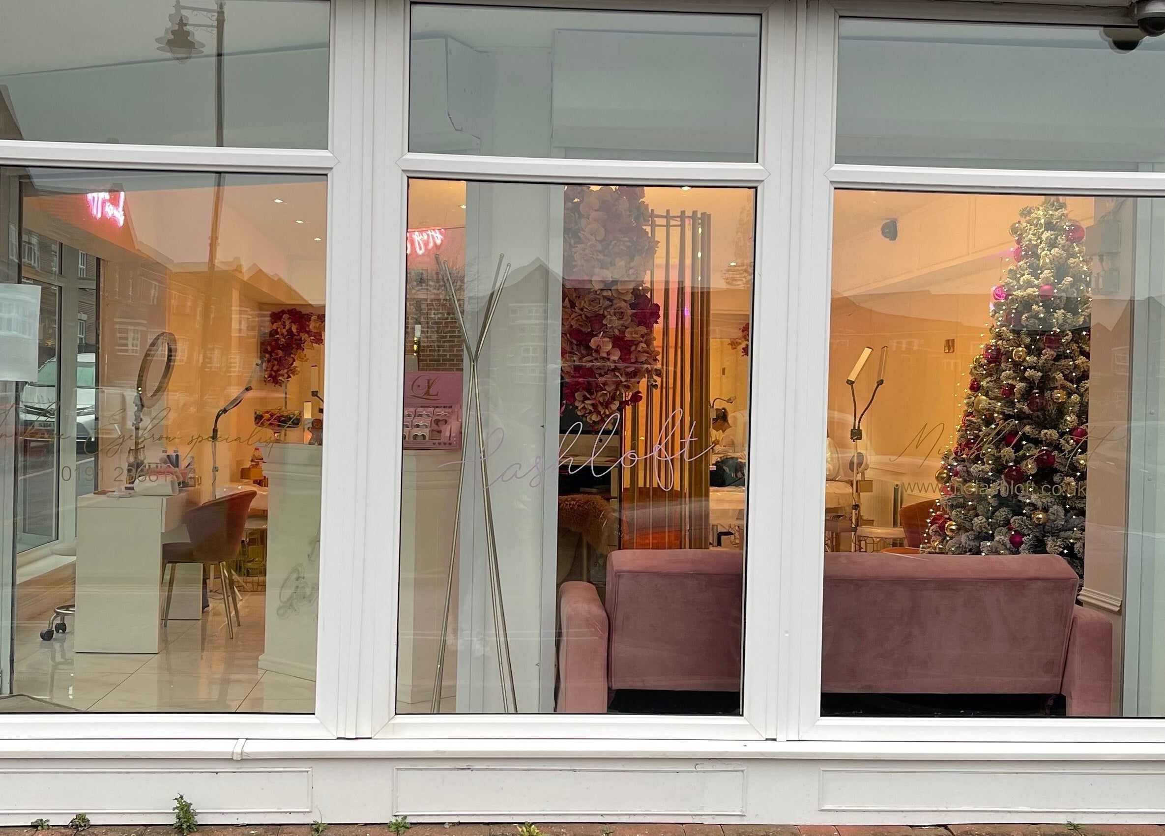 Cozy view of The Lashloft in Newcastle upon Tyne, England, with festive decor and welcoming interior.