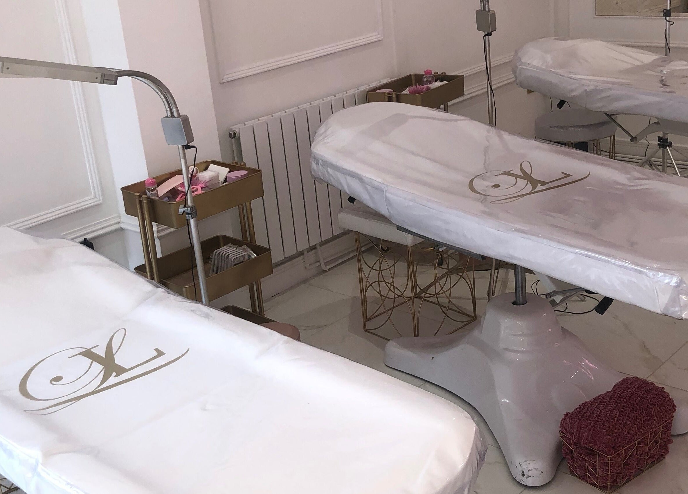 Elegant treatment beds at The Lashloft, Newcastle upon Tyne, England, GB, offering premium beauty services.