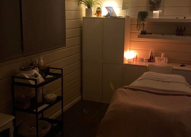 Serene treatment room at The Relaxation Room, Inverness, Scotland, GB, featuring soft lighting and ambiance.