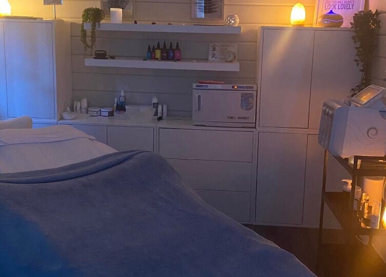 Serene treatment room at The Relaxation Room in Inverness, Scotland, GB, featuring soft ambient lighting.