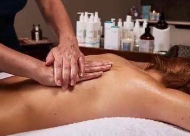 Relaxing back massage at Butterfly Beauty, Elgin, Scotland, GB, offering soothing wellness services.