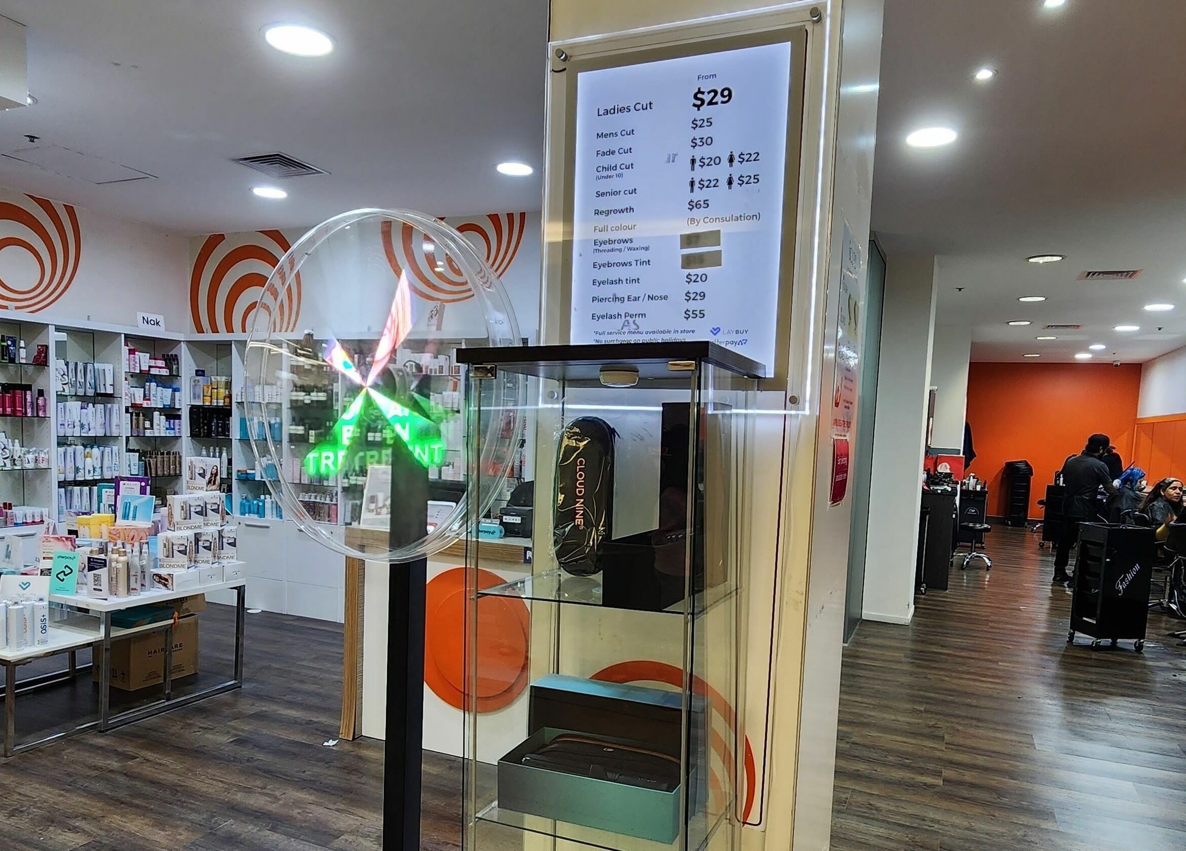 Interior of Kess Hair & Beauty St. Lukes, Auckland, NZ with beauty products and salon services displayed.