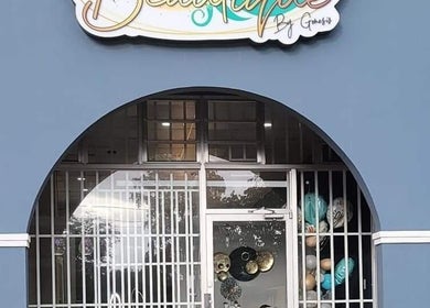 Entrance of Beautique by Genesis in Mayagüez, Mayagüez, PR featuring stylish signage.