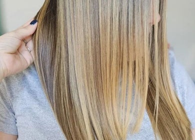Silky smooth blonde hair at Beautique by Genesis, located in Mayagüez, Mayagüez, PR.
